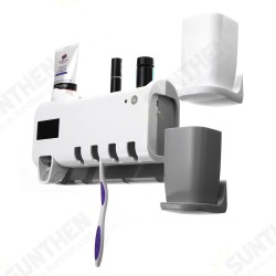 3 in 1 UV Light Toothbrush Sterilizer Holder Cleaner Automatic Toothpaste Dispenser with 2 Cups 3 in 1 UV Light Toothbrush Sterilizer Holder Cleaner Automatic Toothpaste Dispenser with 2 Cups