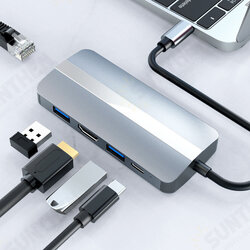 7 in 1 Type-C Docking Station USB-C Hub Splitter Adaptor with USB-C USB3.0 2.0 PD 87W 4K/30HZ 100Mbps RJ45 LAN Ethernet SD/TF Card Reader Slot 7 in 1 Type-C Docking Station USB-C Hub Splitter Adaptor with USB-C USB3.0 2.0 PD 87W 4K/30HZ 100Mbps RJ45 LAN Ethernet SD/TF Card Reader Slot
