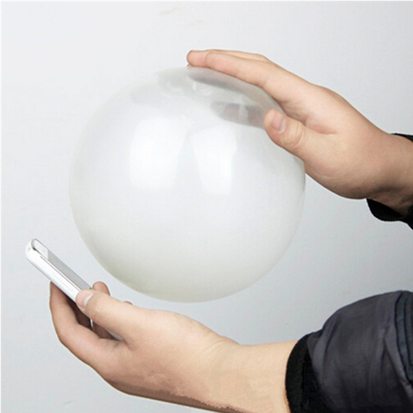 Close-Up-Magic-Street-Trick-Mobile-Into-Balloon-Penetration-In-A-Flash-Party-986508-1